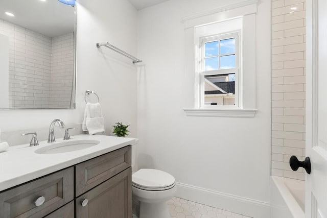 full bathroom featuring tile patterned floors, vanity, toilet, and tiled shower / bath