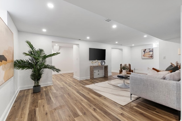 living room with hardwood / wood-style floors