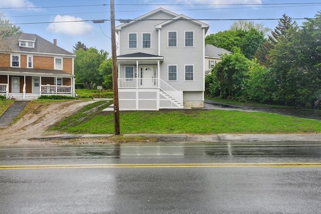 517 Primrose St, Haverhill, MA 01830 - view of front of home with a porch and a front yard