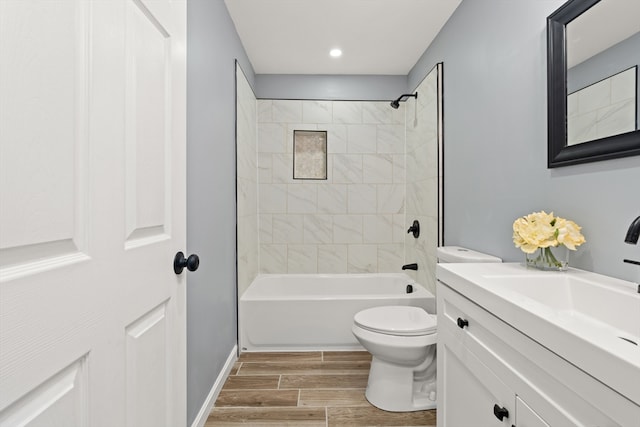 517 Primrose St, Haverhill, MA 01830 - bathroom with toilet, wood finished floors, vanity, bathing tub / shower combination, and recessed lighting