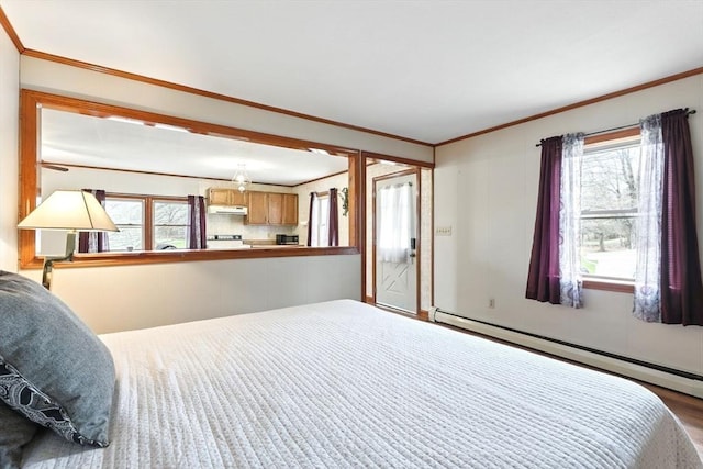 bedroom with ornamental molding and a baseboard heating unit