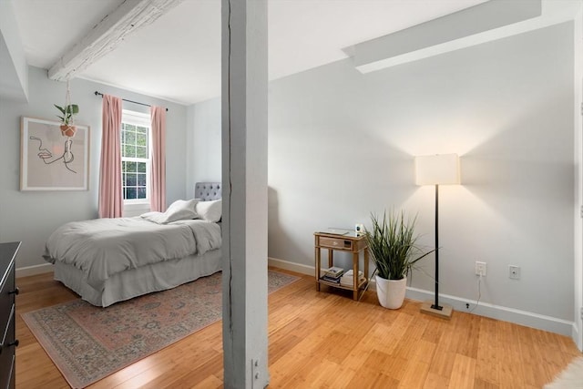 7 S Stone Mill Dr Unit 403, Dedham, MA 02026 - bedroom with beam ceiling, light wood-type flooring, and baseboards