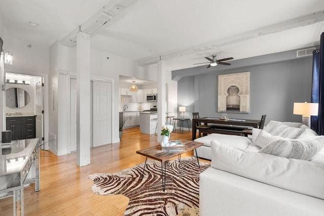 7 S Stone Mill Dr Unit 403, Dedham, MA 02026 - living area with ceiling fan and light wood finished floors