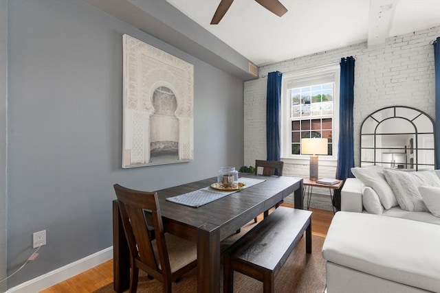 7 S Stone Mill Dr Unit 403, Dedham, MA 02026 - dining room with wood finished floors, a ceiling fan, brick wall, and baseboards