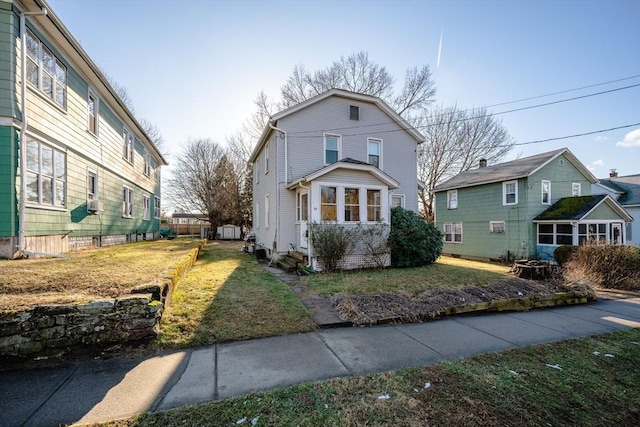 front facade with a front lawn