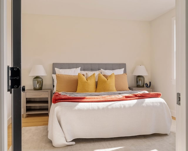 bedroom with light wood-type flooring