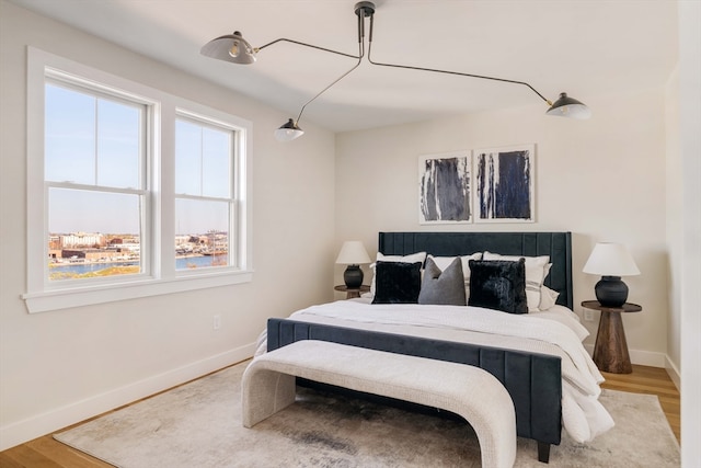 bedroom featuring wood-type flooring