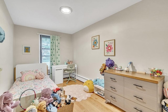32 Juniper St Unit 91, Brookline, MA 02445 - bedroom featuring light wood-style floors and baseboard heating
