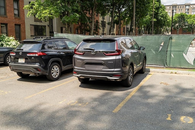 32 Juniper St Unit 91, Brookline, MA 02445 - view of uncovered parking lot