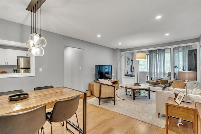 32 Juniper St Unit 91, Brookline, MA 02445 - living area featuring light wood finished floors and recessed lighting