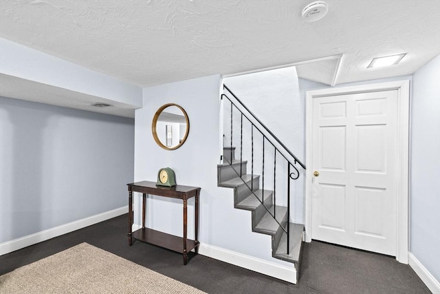 58 Spring St, Weymouth, MA 02188 - stairway featuring a textured ceiling, baseboards, and carpet flooring