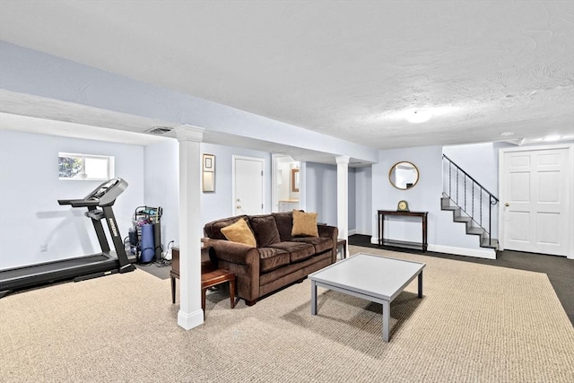 58 Spring St, Weymouth, MA 02188 - living area featuring dark carpet, stairs, and baseboards