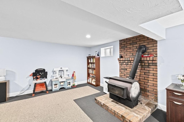 58 Spring St, Weymouth, MA 02188 - living room with a wood stove, baseboards, carpet flooring, and recessed lighting