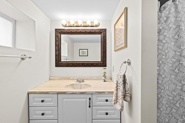 58 Spring St, Weymouth, MA 02188 - bathroom featuring vanity and a shower