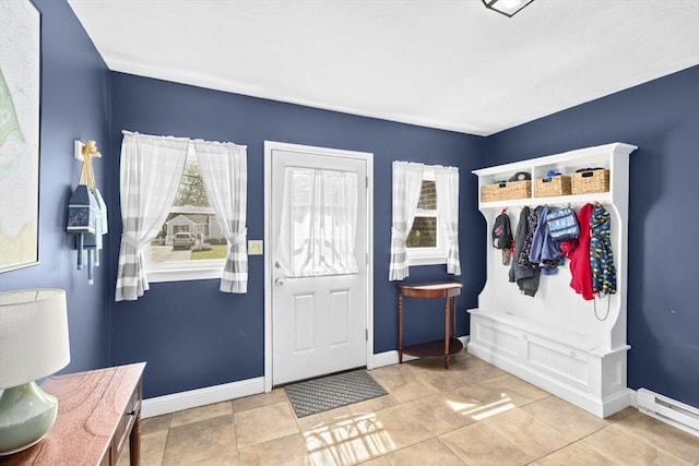 58 Spring St, Weymouth, MA 02188 - foyer featuring baseboard heating, baseboards, and tile patterned floors