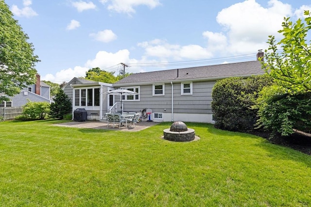 58 Spring St, Weymouth, MA 02188 - rear view of house featuring a fire pit and a patio