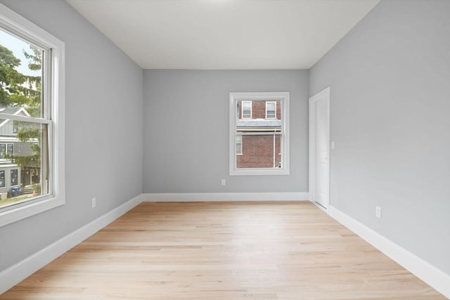 empty room with light wood-type flooring