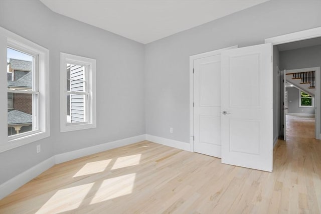 unfurnished bedroom featuring light hardwood / wood-style flooring