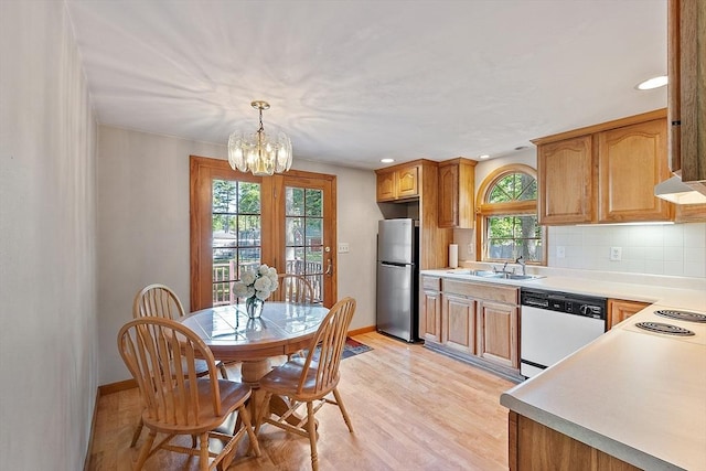 15 Moore Rd, Westford, MA 01886 - kitchen featuring freestanding refrigerator, dishwasher, a sink, plenty of natural light, and recessed lighting