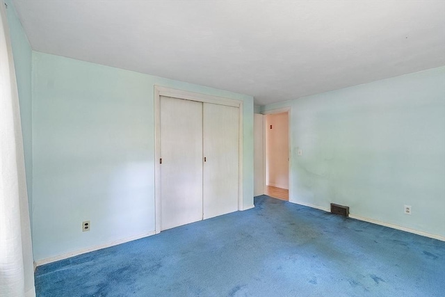 15 Moore Rd, Westford, MA 01886 - unfurnished bedroom with carpet flooring, a closet, and baseboards