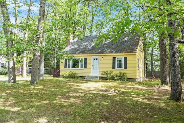 15 Moore Rd, Westford, MA 01886 - new england style home featuring a chimney and roof with shingles