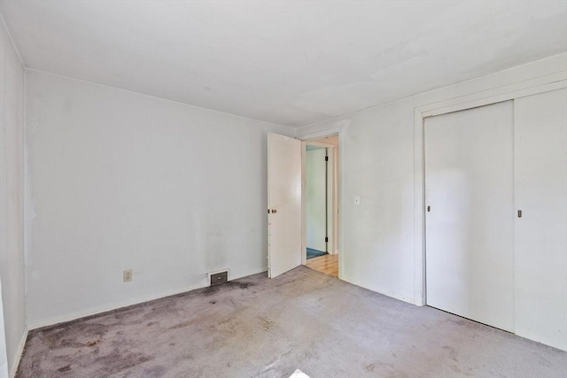 15 Moore Rd, Westford, MA 01886 - unfurnished bedroom featuring carpet and a closet
