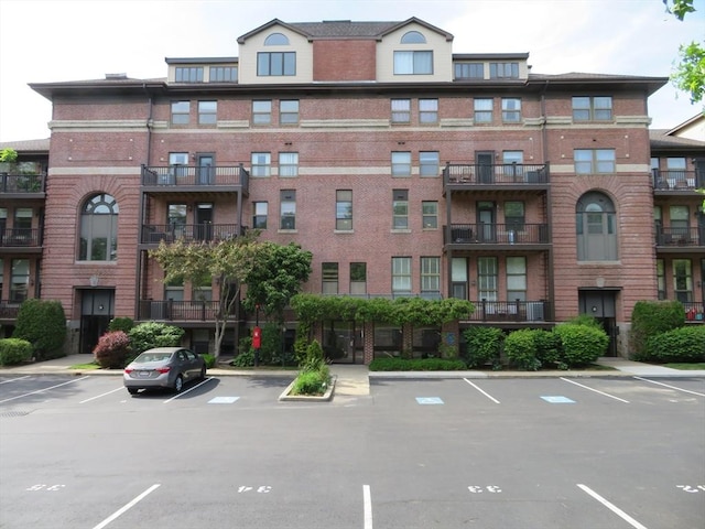 155 Kendrick Ave Unit 306, Quincy, MA 02169 - view of building exterior featuring uncovered parking