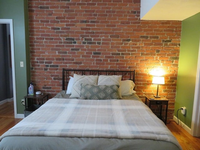 155 Kendrick Ave Unit 306, Quincy, MA 02169 - bedroom with baseboards and wood finished floors