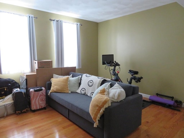 155 Kendrick Ave Unit 306, Quincy, MA 02169 - living room featuring healthy amount of natural light and light wood finished floors