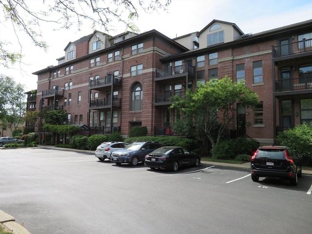 155 Kendrick Ave Unit 306, Quincy, MA 02169 - view of building exterior featuring uncovered parking