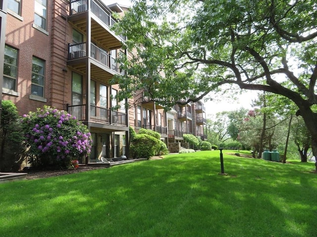 155 Kendrick Ave Unit 306, Quincy, MA 02169 - view of community with a yard