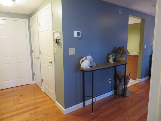 155 Kendrick Ave Unit 306, Quincy, MA 02169 - corridor with wood finished floors and baseboards