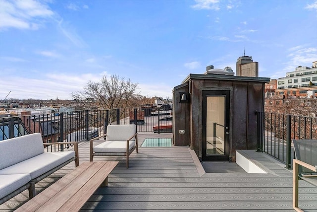 wooden deck featuring an outdoor hangout area