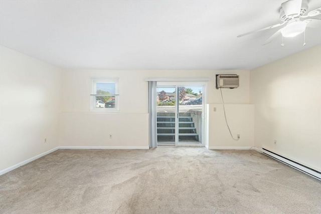 200 Manville Hill Rd Unit B-28, Cumberland, RI 02864 - carpeted empty room featuring a wall mounted air conditioner, baseboard heating, baseboards, and ceiling fan