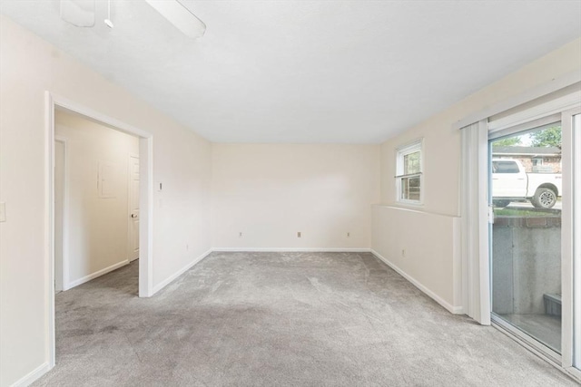 200 Manville Hill Rd Unit B-28, Cumberland, RI 02864 - empty room featuring light colored carpet, baseboards, and ceiling fan