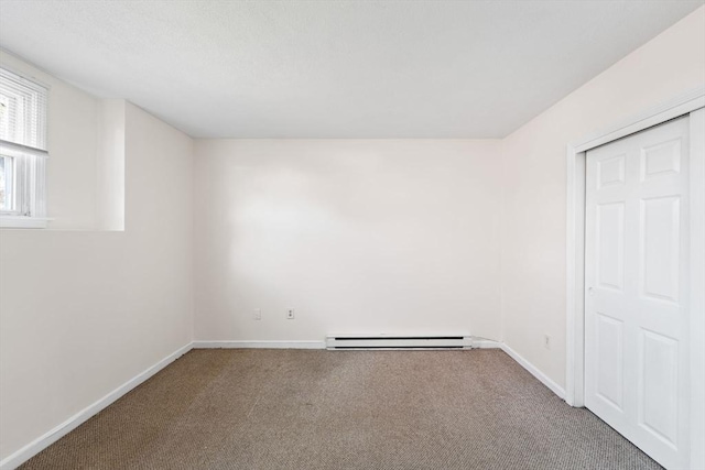 200 Manville Hill Rd Unit B-28, Cumberland, RI 02864 - unfurnished bedroom with a baseboard radiator, carpet flooring, and baseboards