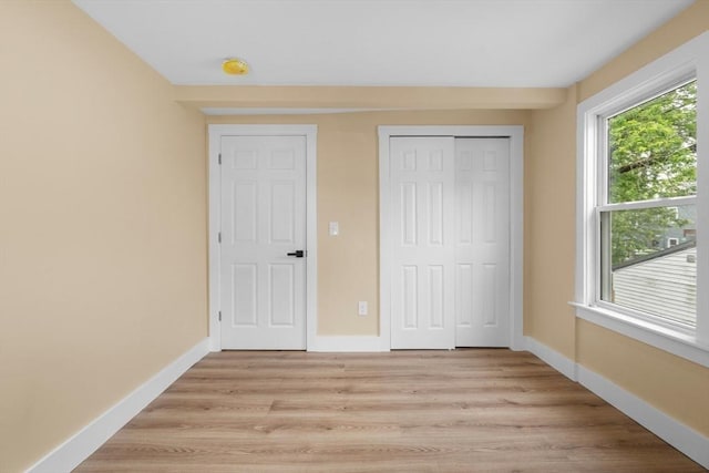 29 Beaver St, Salem, MA 01970 - unfurnished bedroom featuring light wood-type flooring and a closet