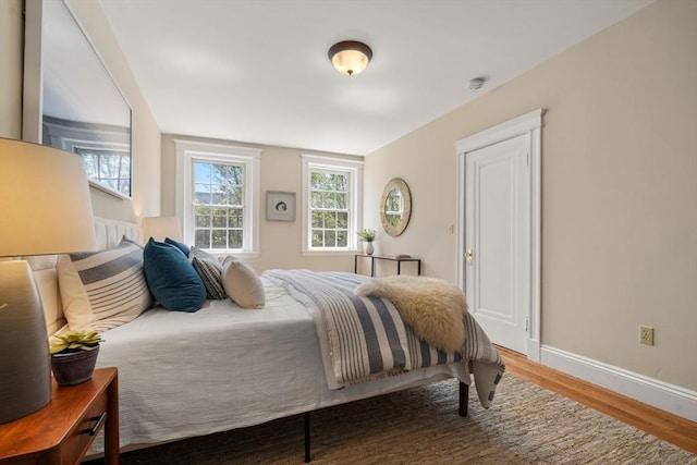 854 Massachusetts Ave Unit 11, Cambridge, MA 02139 - bedroom with wood finished floors and baseboards