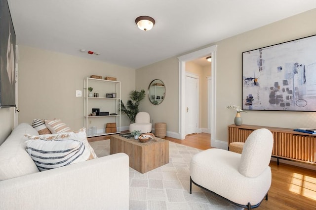 854 Massachusetts Ave Unit 11, Cambridge, MA 02139 - living area with light wood-style floors and baseboards