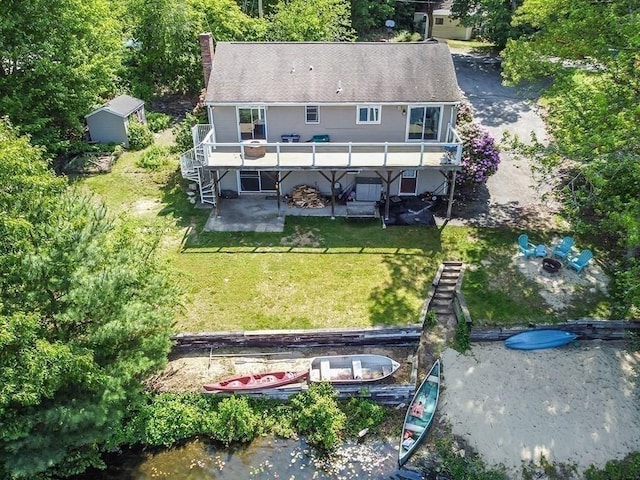 163 Walnut Rd, Wrentham, MA 02093 - back of house featuring a fire pit, stairway, a patio area, and a lawn