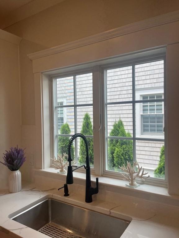 255 Old Main Rd Unit 2A, Falmouth, MA 02556 - kitchen view of a sink and light stone countertops