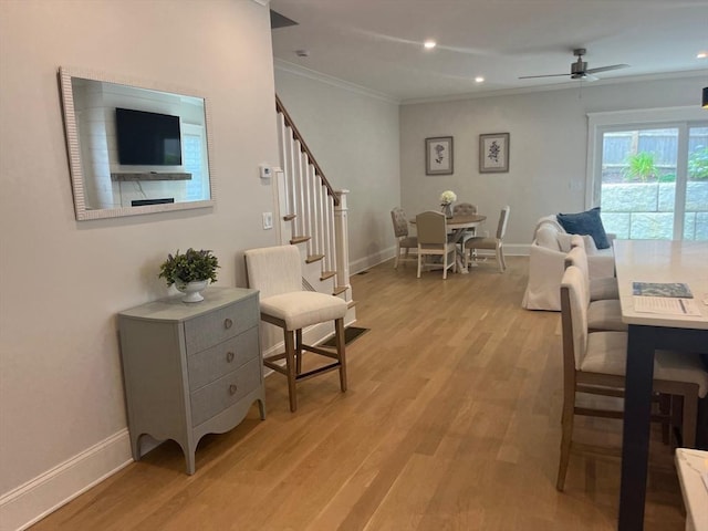 255 Old Main Rd Unit 2A, Falmouth, MA 02556 - living area with stairs, light wood finished floors, crown molding, a ceiling fan, and recessed lighting