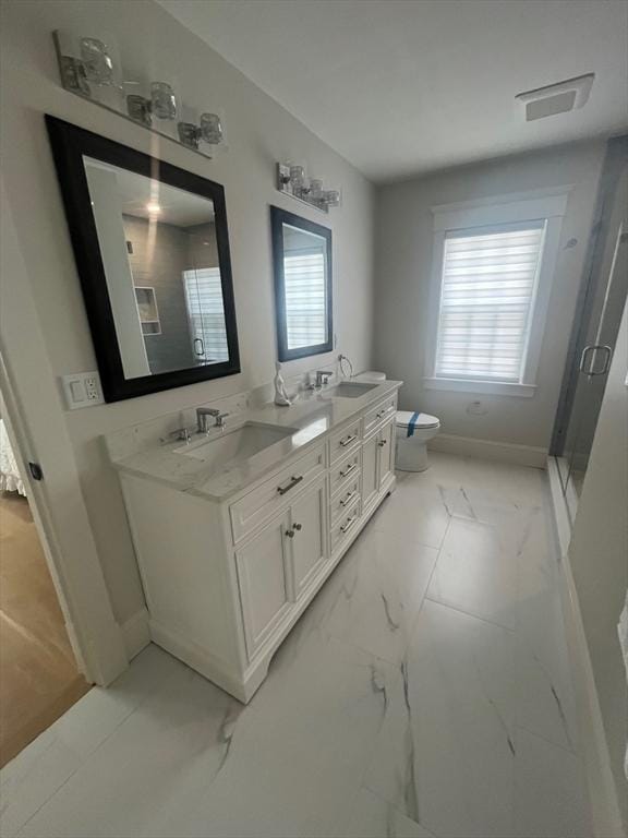 255 Old Main Rd Unit 2A, Falmouth, MA 02556 - full bath with double vanity, marble finish flooring, and a shower stall