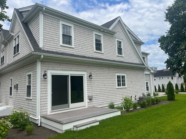 255 Old Main Rd Unit 2A, Falmouth, MA 02556 - rear view of property with a yard and a wooden deck