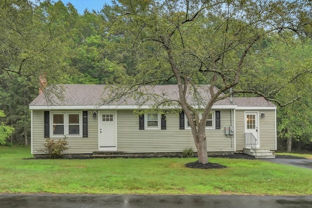 195 Pompeo Rd, Thompson, CT 06255 - ranch-style home featuring entry steps, a chimney, a front lawn, and a shingled roof