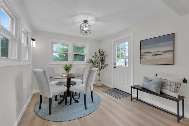 195 Pompeo Rd, Thompson, CT 06255 - dining area featuring light wood-type flooring and baseboards