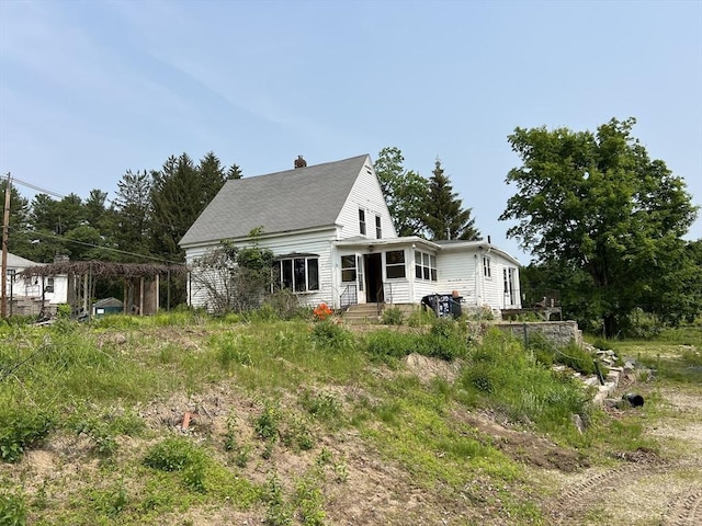 38 Clark St, Medway, MA 02053 - view of front of house featuring a chimney
