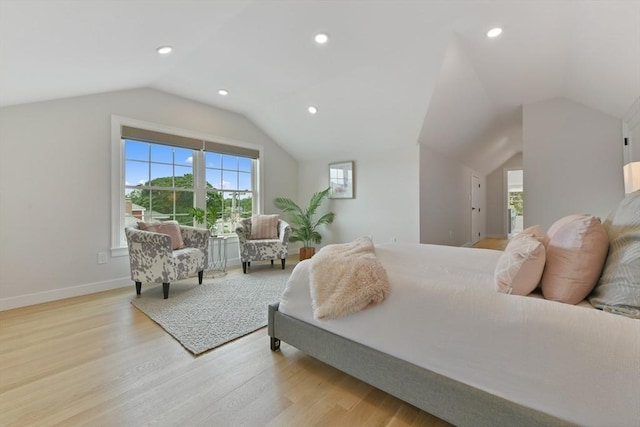 176 Medford St Unit 176, Arlington, MA 02474 - bedroom with lofted ceiling, light wood finished floors, and recessed lighting