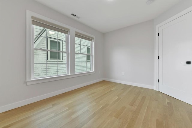 176 Medford St Unit 176, Arlington, MA 02474 - empty room featuring light wood-style flooring and baseboards