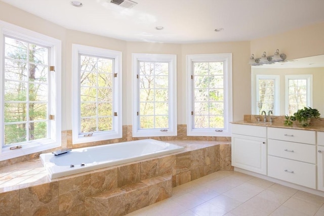 22 Forest Hill Rd, Wayland, MA 01778 - bathroom with healthy amount of natural light, vanity, a bath, and tile patterned floors